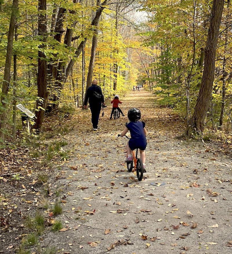 Simonds school kids learning to ride on the story walk section of trail in Warner. Bikes donated in part by CLSRT.